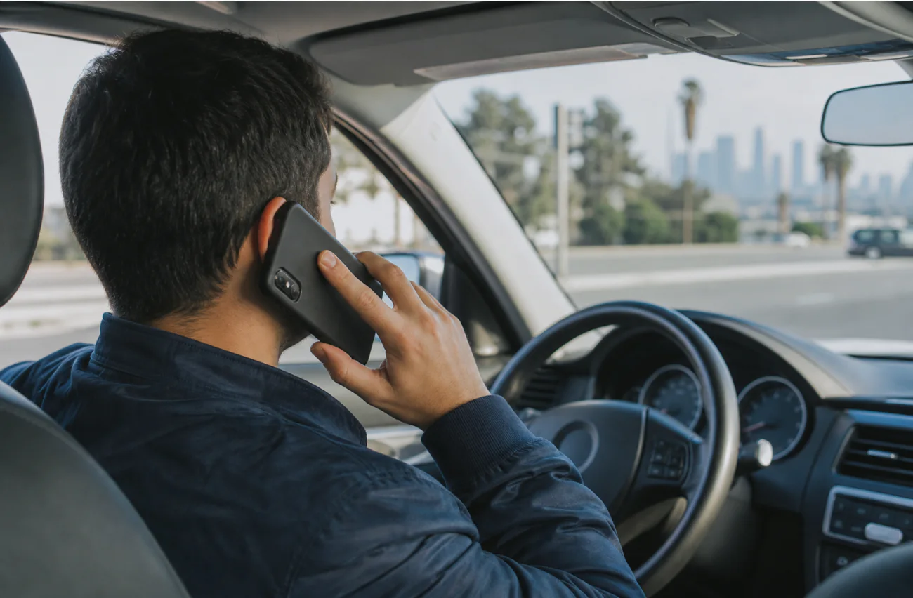 Driver calling Maps Towing for roadside help